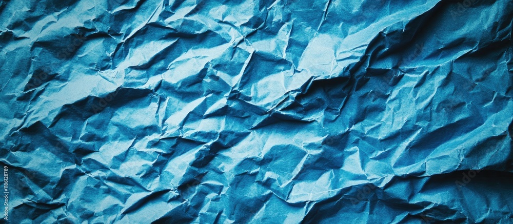 Aufkleber Close up of a blue crumpled piece of construction paper used as a background with blank space for design Blue creased crumpled paper backdrop. with copy space image. Place for adding text or design