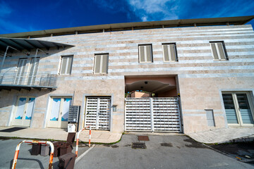 Bed and Breakfast exterior view. Street and entrance of a modern building