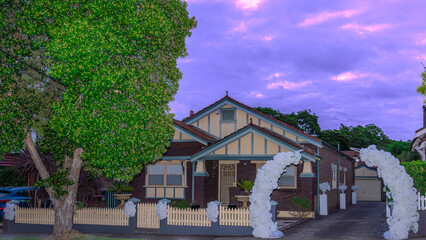 Suburban residential Brick house in Sydney  NSW Australia Brides house  decorated for a wedding day celebrations with white roses flowers