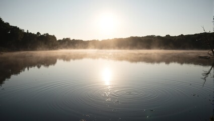 Fototapeta premium Tranquil morning scene with sunlit lake and gentle ripples evoking serenity