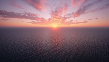 Sun setting over a golden ocean with colorful sky at twilight