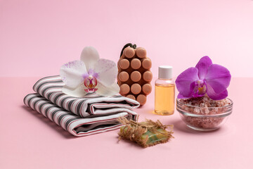 Personal care products on the pink background. Spa accessories.