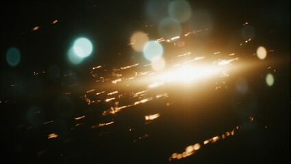 Abstract golden  turquoise streaks on blurred canvas with light bursts  bokeh giving vintage analog vibes