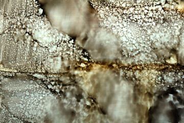 art background of stains with dry drops in olive black color