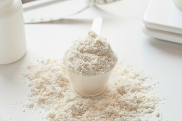 Protein Powder Scoop on White Background