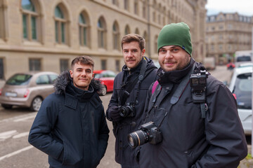 Fototapeta premium Group of photographers on an urban street
