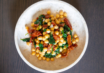 Healthy Salad with Chickpeas, Sun-Dried Tomatoes, and Spinach Close-Up