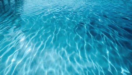 Obraz premium rippling turquoise water with light reflections and abstract shadows of palm trees, perfect for tropical designs, background, or relaxation themes