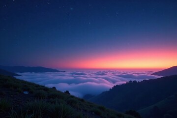 Obraz premium Cloudy evening with starry sky and fog rolling in over the hills, twilight, natural world