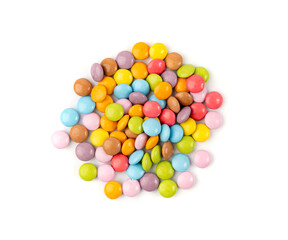 Scattered small candies isolated. Colorful dragees, multicolored glazed chocolate buttons