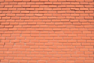 Obraz premium The background of the brick wall with dark orange is beautifully arranged. Ancient wall Grunge background The backdrop may be used in interior design
