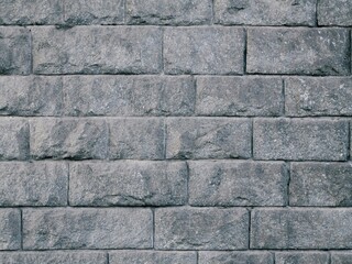 Old stone wall in shadow