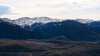 Snow-capped mountains in haze, view from the village of Font-Romeu, France, tourism, vacation