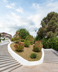 The tranquil ambiance of Sabail Park, nestled amidst lush landscaped gardens and staircases that ascend to the verdant expanse, Baku, Azerbaijan