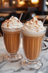 National Cafe au Lait Day Creamy caramel macchiato delight with whipped cream in glass mugs