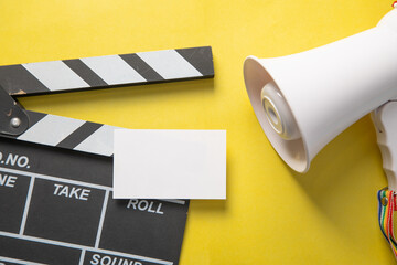 Black clapper board with a empty card.
