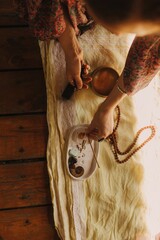 Woman practicing yoga and meditation in a Buddhist temple, relaxed with closed eyes. Mindful...