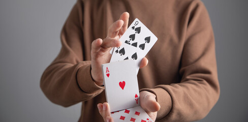 Man showing playing cards. Hobby