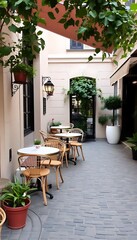 Courtyard Cafe With Wicker Chairs And Plants