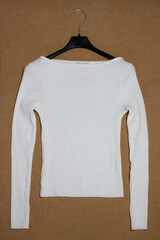 white women's knitted basic sweater on a hanger, mock up
