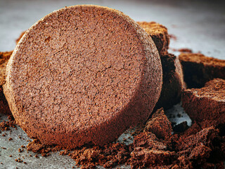 Close-up of coffee grounds from espresso machine. coffee ground on gray background