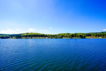 View of Lake Sorpe and the surrounding landscape. Nature at the Sorpe Dam near Arnsberg.
