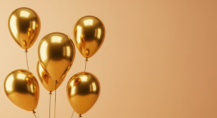 Gold-foil balloons on a soft peach backdrop for elegant celebrations