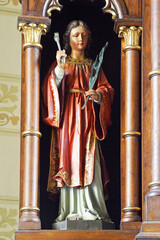 Obraz premium Saint Apollonia, statue on the altar of Saint Barbara in the parish church of the Assumption of the Virgin Mary in Resnik, Croatia