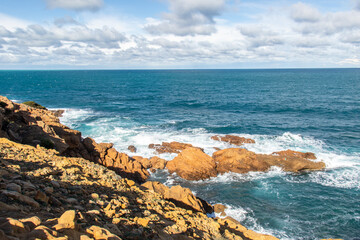 Port aux Princes, Tunisia, Cliffs and Rocks, Mediterranean Sea landscape with beautiful blue sky....