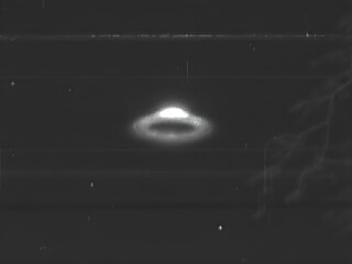Close Encounter: Black and White UFO Photograph