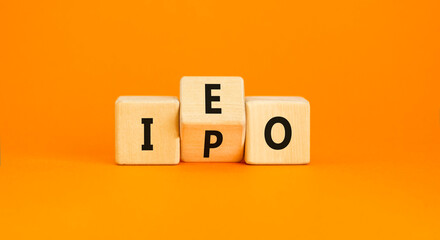 Initial public or exchange offering symbol. Concept words abbreviation IPO IEO on wooden block....