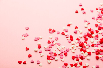 Sugar hearts on pink background. Romantic, St Valentines day concept. Top view.