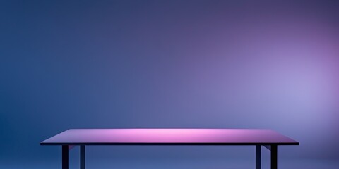 A desk with a blue background and purple lighting