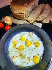 fried quail eggs in a pan
