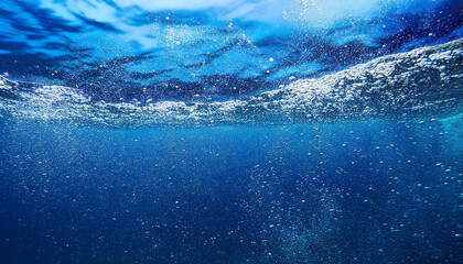 the image is a blue ocean with a lot of blue and white specks