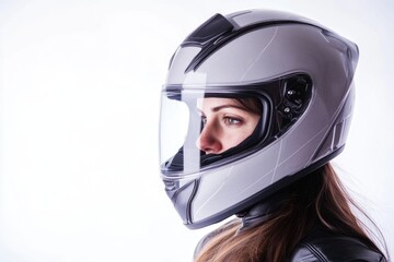 Woman riding motorcycle with helmet and leather jacket, outdoors