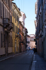 Old buildings along via Lanzone, historic street of Milan, Italy
