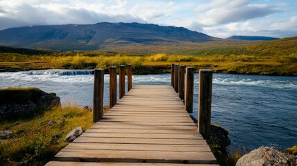 Fototapeta premium Serene Wooden Dock Overlooking Calm River with Lush Green Landscape and Majestic Mountains in Background