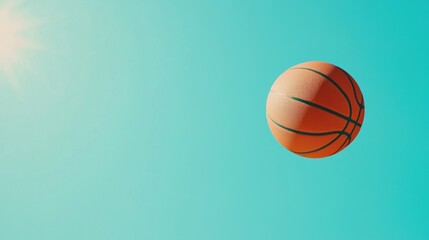 Obraz premium Orange Basketball in Mid-Air Against Clear Blue Sky Background
