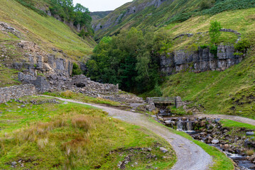 Footbridge at Fair Yew End in the Swinner Gild, which is a wild and remote area in the Swaledale in the Yorkshire Dales National Park.