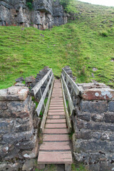Footbridge at Fair Yew End in the Swinner Gild, which is a wild and remote area in the Swaledale in the Yorkshire Dales National Park.