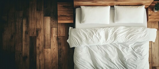 Top view of a cozy bedroom with a wooden sleep sign and empty space for text creating a calming atmosphere for relaxation and rest.