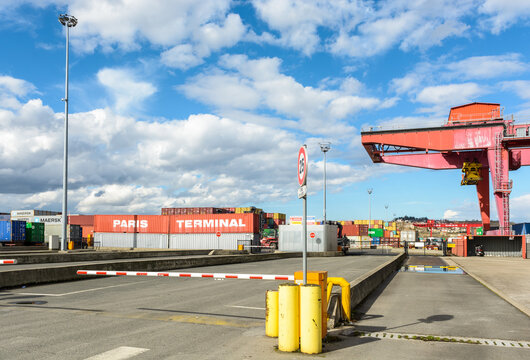 Gennevilliers, France - March 11, 2018: Main road access to the intermodal terminal run by the company Paris Terminal in the Gennevilliers port, first french river port, in the north-west of Paris.