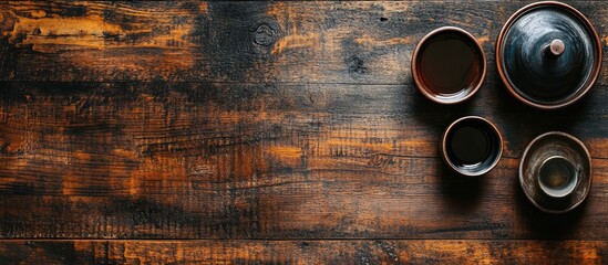 Rustic wooden tabletop featuring decorative bowls and cups perfect for product photography and commercial display settings