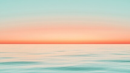 Obraz premium Serene ocean horizon with soft pastel sunset sky perfect for vacation relaxation and artistic wallpaper background design projects.