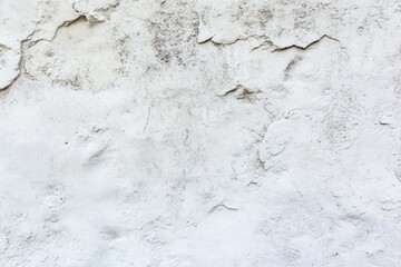 A bright red fire hydrant sits atop a gray concrete wall, ready for use in case of emergency