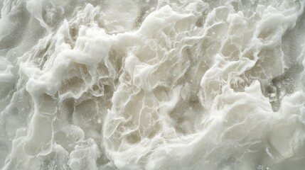 Obraz premium White Foam Waves Over Sand Surface