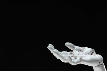 Artificial intelligence. Robot hand gesturing on black background, space for text