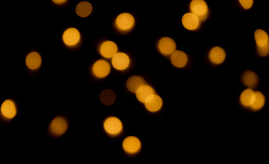 golden bokhe at night,Beautiful blurred light bokhe for background material.