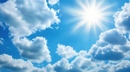 Bright sun shining through fluffy white clouds in a vivid blue sky. (2)